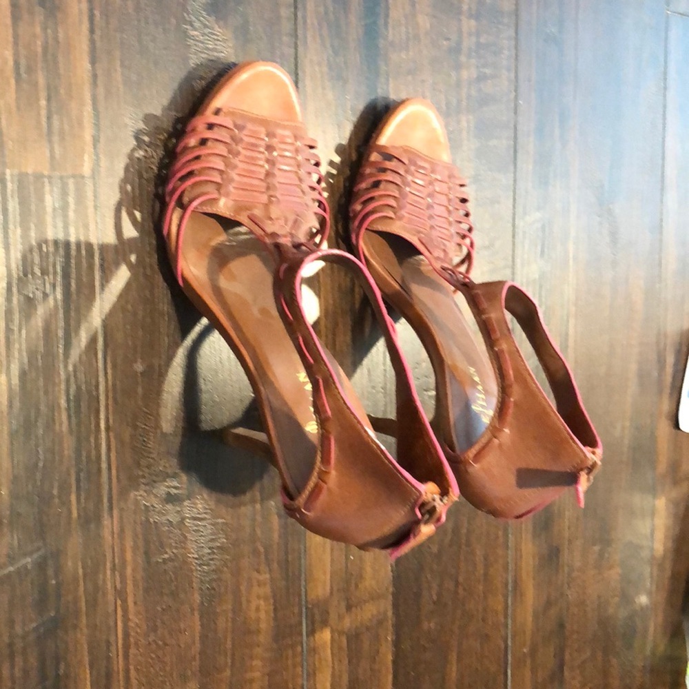 Never worn. Beautiful unique summer heel.